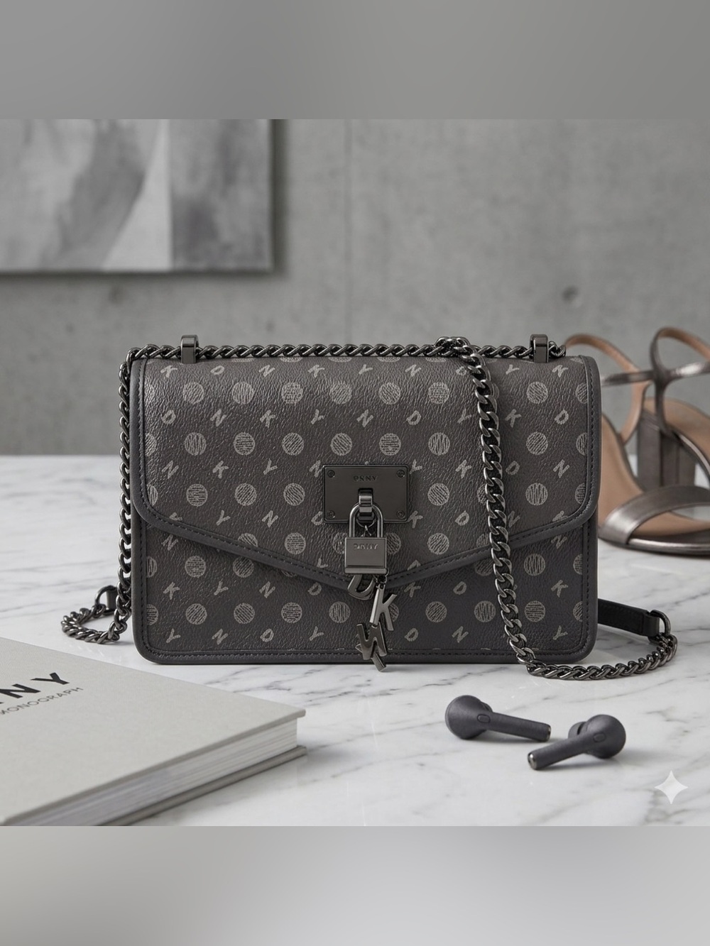 DKNY Elissa Heritage Logo Flap Shoulder Bag in a charcoal grey colorway.